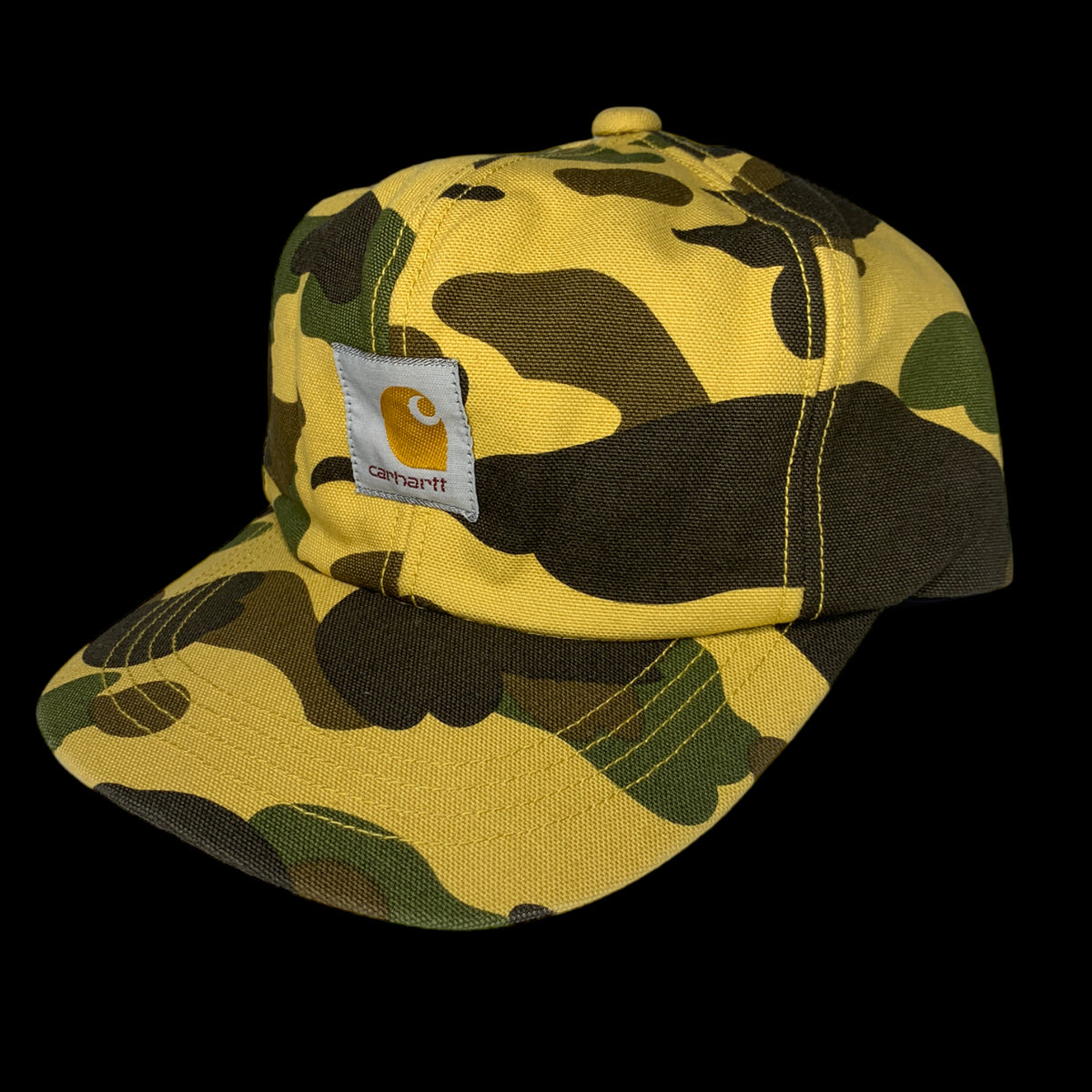 APE BAPE CARHARTT 1st CAMO キャップ　ダック地 BAPE x CARHARTT | 1st Camo Canvas Earflap Hat (Yellow) | M