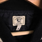 BAPE x STUSSY | Survival Of The Fittest Varsity Jacket (Black) | M