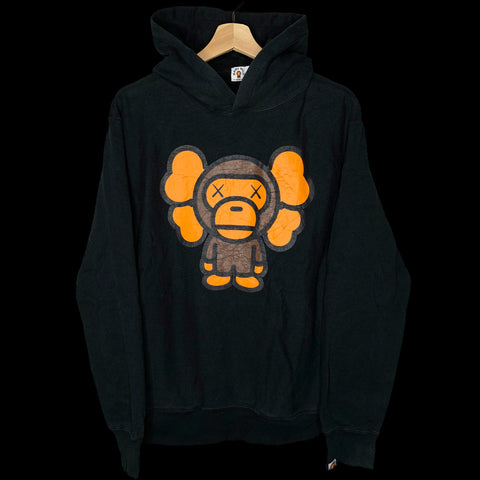 BAPE x KAWS | Baby Milo Pullover Hoodie (Black/Orange) | M