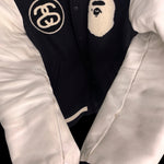 BAPE x STUSSY | Survival Of The Fittest Varsity Jacket (Black) | M